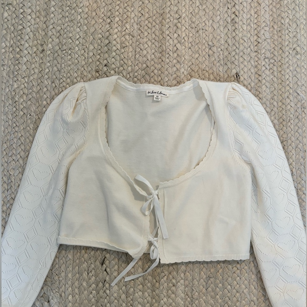For love and lemons knit long sleeve tie top.